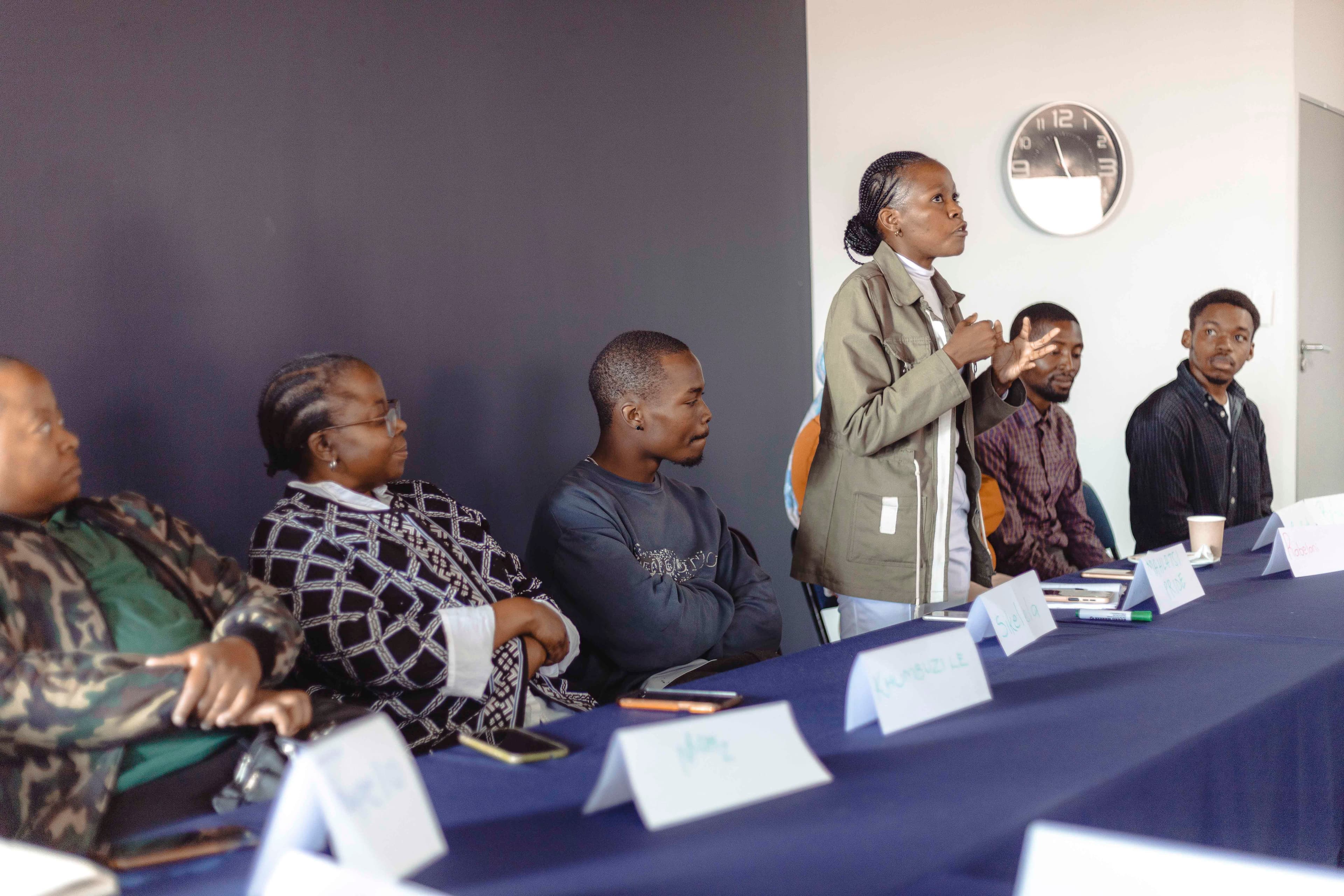 Nelson speaking and presenting project to mentors and panel